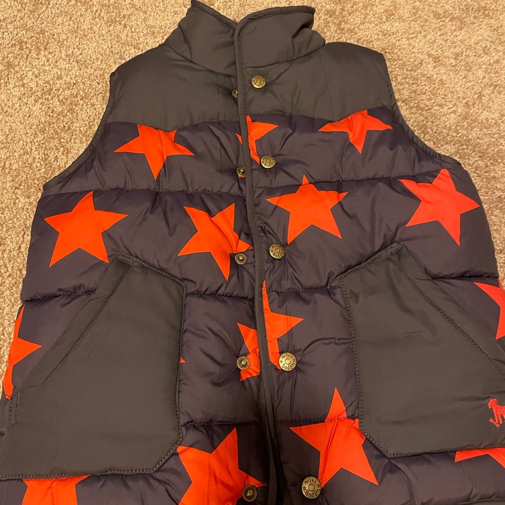 Adorable Boden orange-ish red and navy star Sherpa vest.